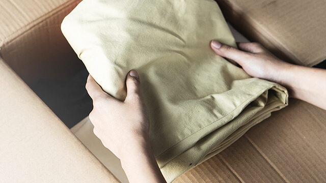 キットに衣類を詰めて 集荷を依頼